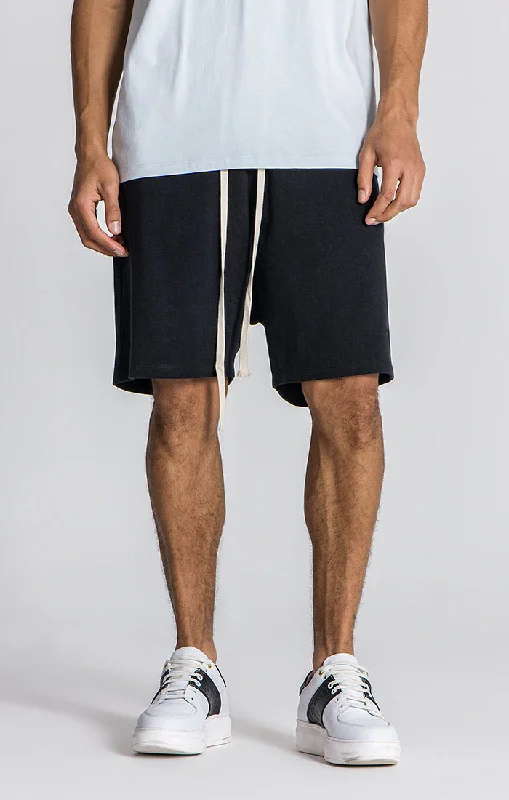 Men's ripped denim shorts for a trendy streetwear aestheticBlack Vedrà Shorts