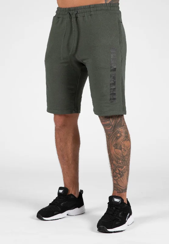 Men's ripped denim shorts for a trendy streetwear aestheticMilo Shorts - Green