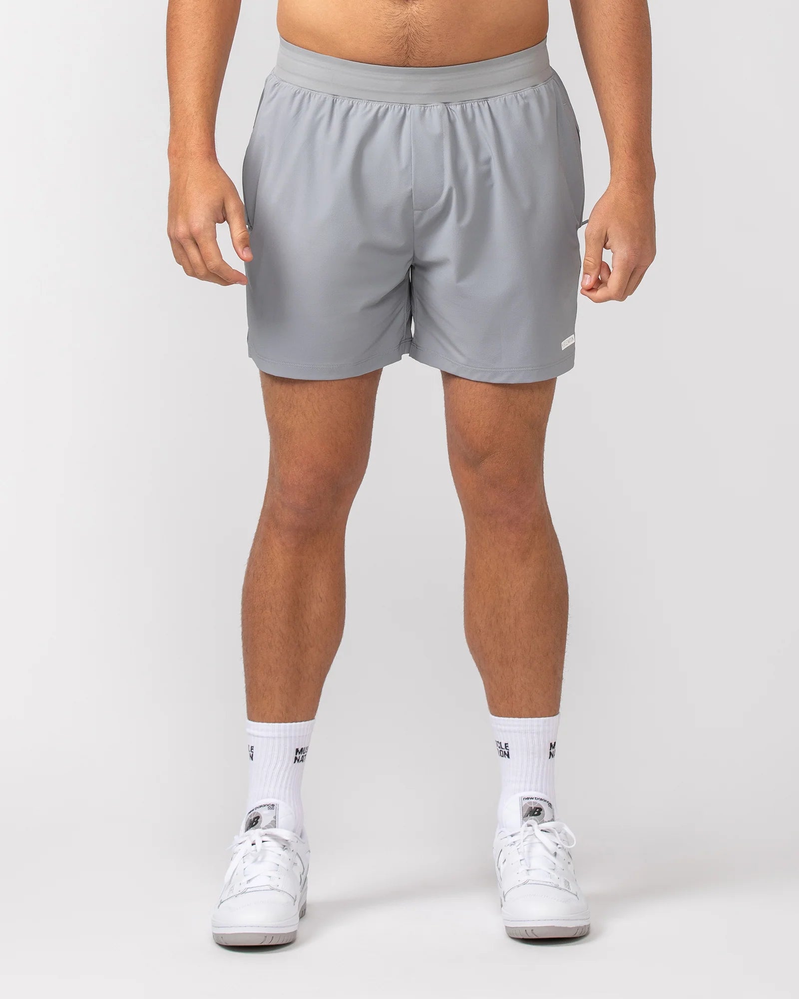 Men's plaid pattern wool blend shorts for a preppy fall styleMuscle Nation | On Repeat Training 5" Shorts - Jet Grey