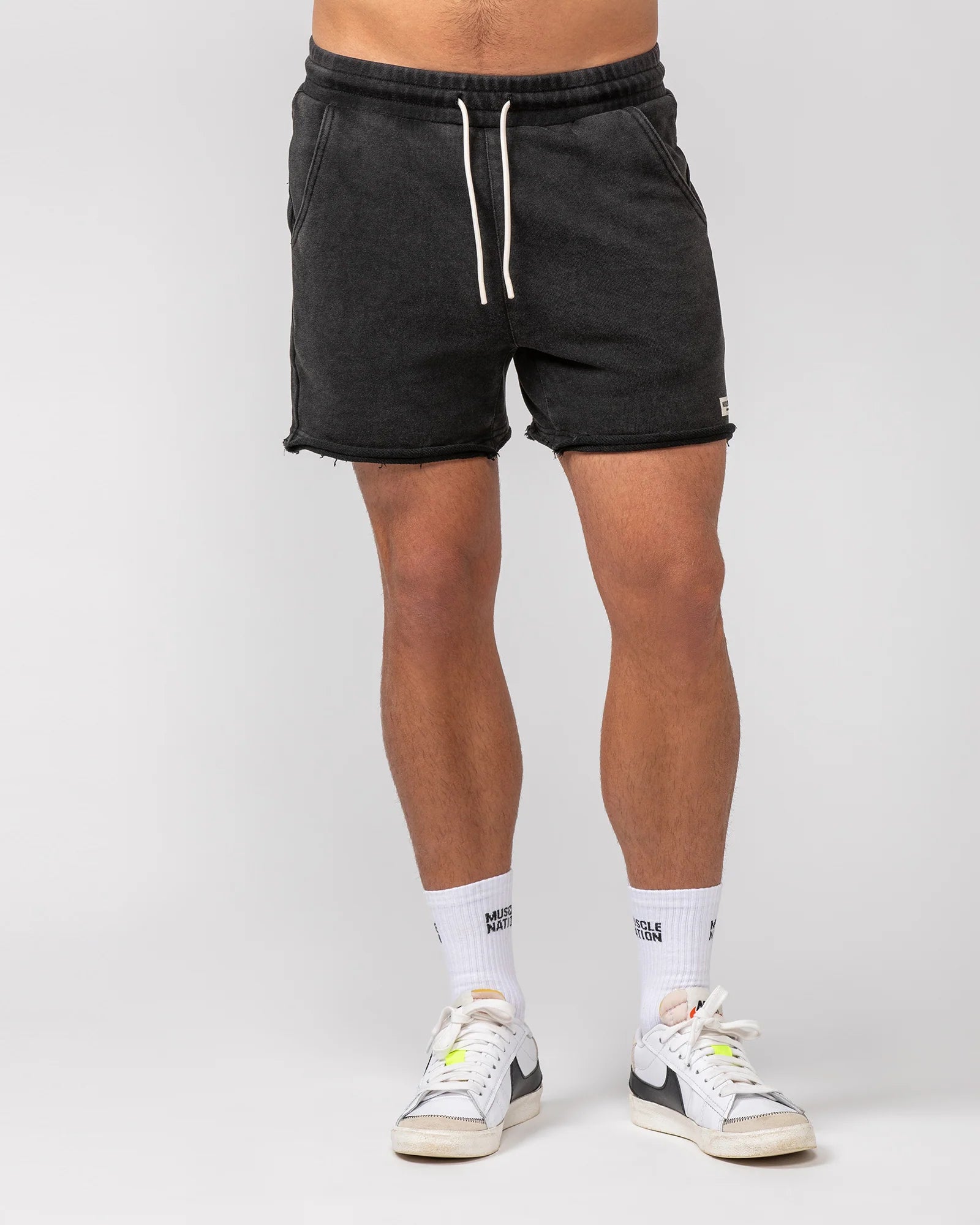 Men's floral print silk blend shorts for a unique night - out lookMuscle Nation | Raw Hem 5" Shorts - Washed Black