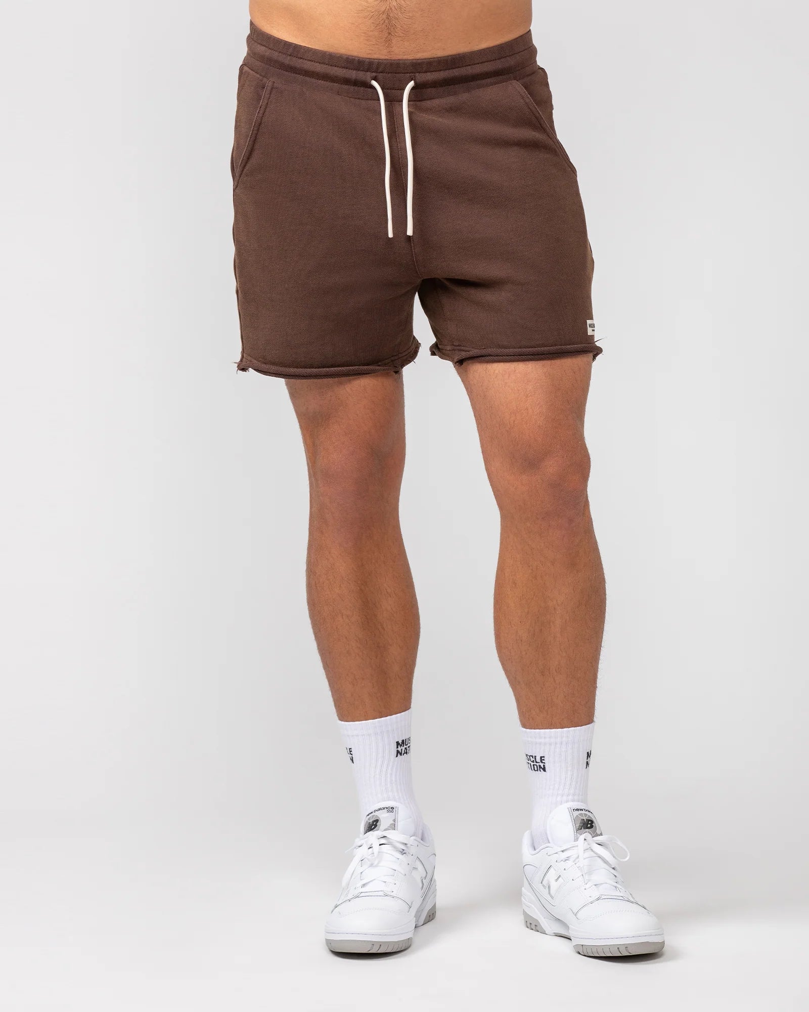 Men's drawstring casual linen shorts for a laid - back summer lookMuscle Nation | Raw Hem 5" Shorts - Washed Brown