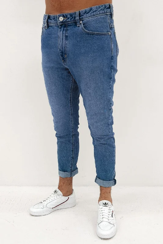 Men's Distressed Jeans with Patches for a Retro and DIY - Inspired AppearanceA Dropped Slim Jean After Hours OG