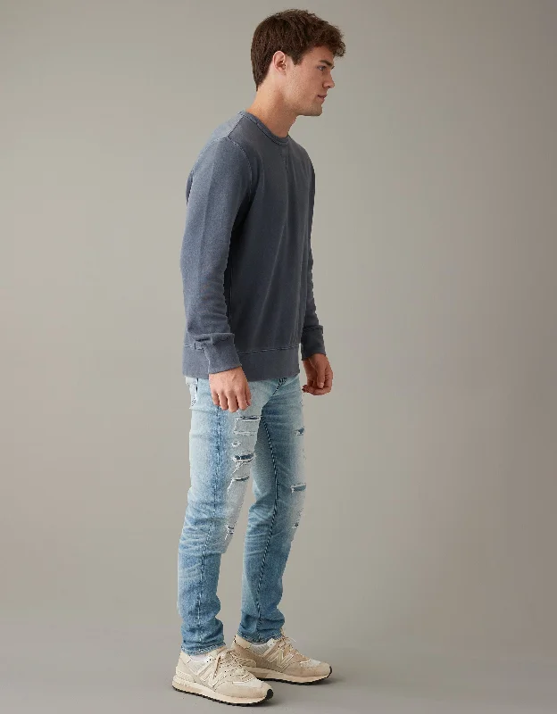 Men's Jeans with a Frayed Hem for a Casual and Effortless StyleAE AirFlex+ Patched Athletic Fit Jean