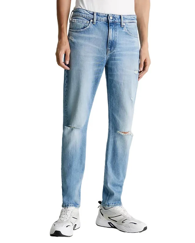 Men's Distressed Jeans with Patches for a Retro and DIY - Inspired AppearanceCalvin Klein Jeans  Mens Straight Light Blue Ripped Denim Jeans